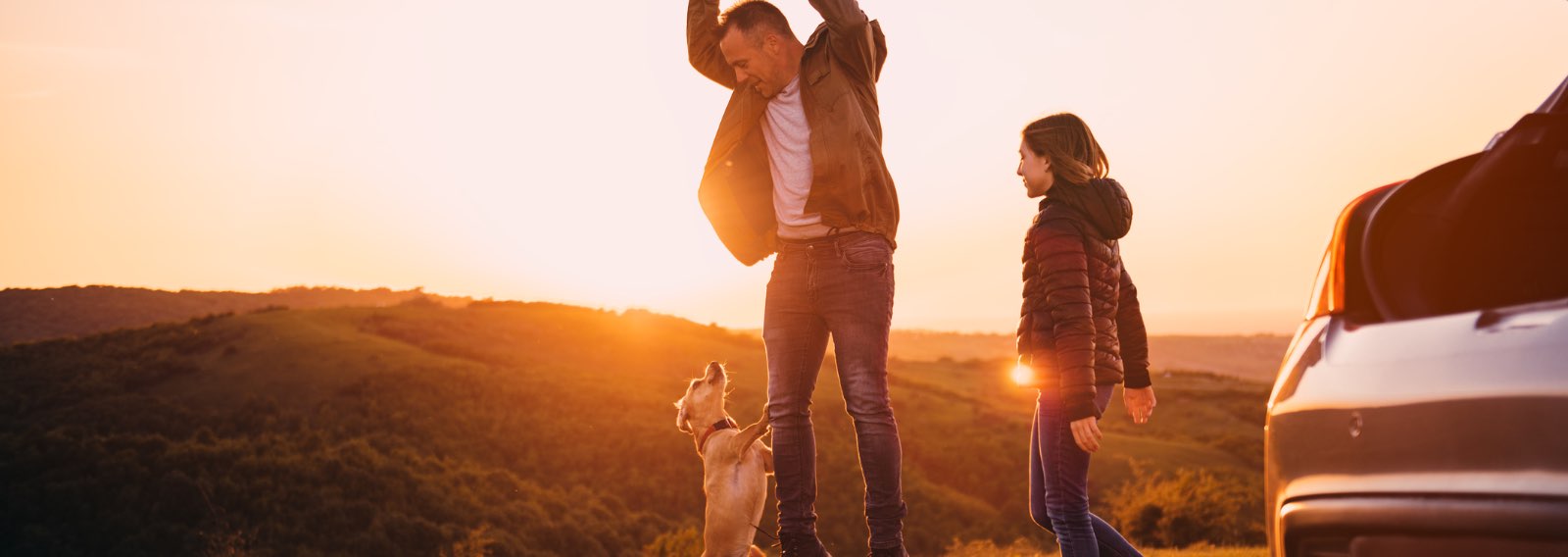 Family outside of their car